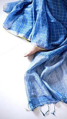 PURE LINEN INDIGO SAREE WITH SILVER ZARI CHECKS AND YELLOW BORDER