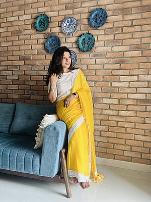 Yellow Mulmul Saree with Crochete Lace Border