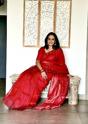 Pure Muslin with all over sequins woven and woven Border - Red Pure Muslin with all over sequins woven and woven Border - Red