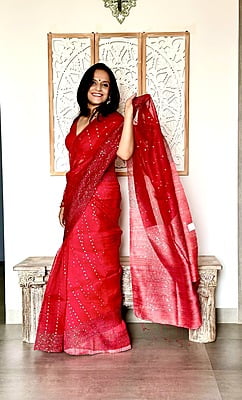 Pure Muslin with all over sequins woven and woven Border - Red Pure Muslin with all over sequins woven and woven Border - Red