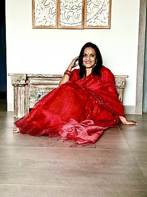 Pure Muslin with all over sequins woven and woven Border - Red Pure Muslin with all over sequins woven and woven Border - Red