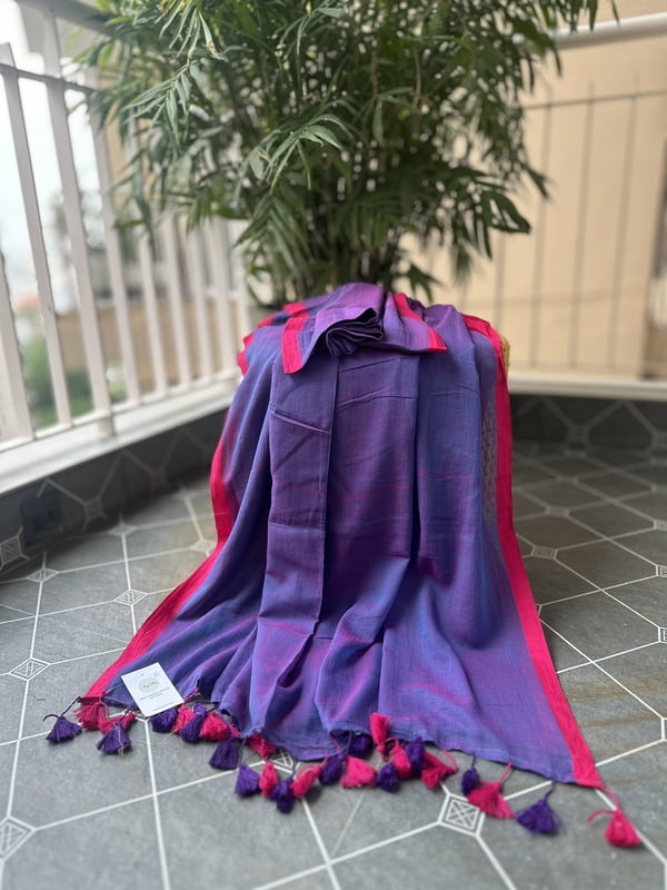 Peacock Blue Mulmul Saree with Pink Border Peacock Blue Mulmul Saree with Pink Border