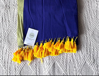 PURPLE MUL COTTON PLAIN SAREE WITH YELLOW INCH BORDER AND POMPOMS ON PALLU PURPLE MUL COTTON PLAIN SAREE WITH YELLOW INCH BORDER AND POMPOMS ON PALLU