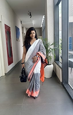 White & Grey Khadi Cotton Saree with Orange Border White & Grey Khadi Cotton Saree with Orange Border