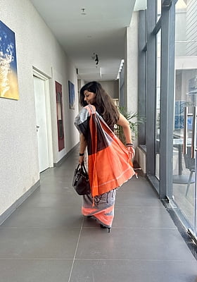 White & Grey Khadi Cotton Saree with Orange Border White & Grey Khadi Cotton Saree with Orange Border