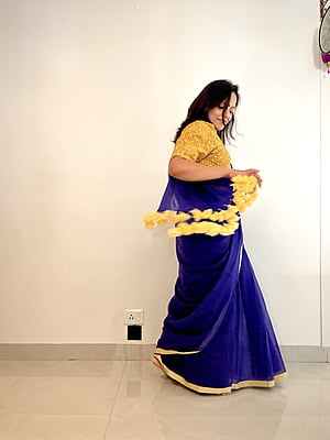 PURPLE MUL COTTON PLAIN SAREE WITH YELLOW INCH BORDER AND POMPOMS ON PALLU PURPLE MUL COTTON PLAIN SAREE WITH YELLOW INCH BORDER AND POMPOMS ON PALLU