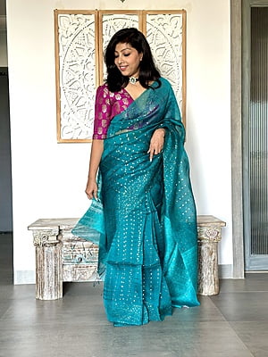 Pure Muslin saree with all over Sequins woven and Woven Border - Green