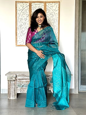 Pure Muslin saree with all over Sequins woven and Woven Border - Green