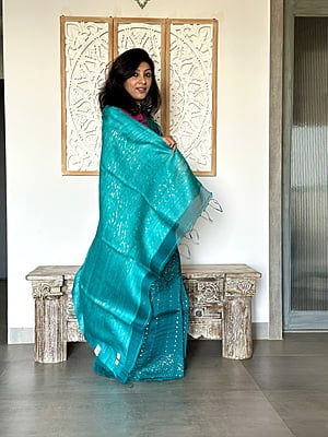 Pure Muslin saree with all over Sequins woven and Woven Border - Green