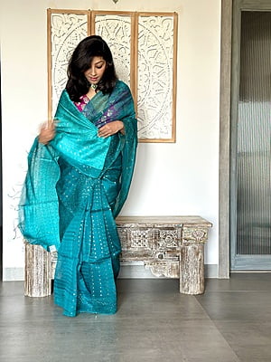 Pure Muslin saree with all over Sequins woven and Woven Border - Green