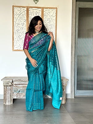 Pure Muslin saree with all over Sequins woven and Woven Border - Green