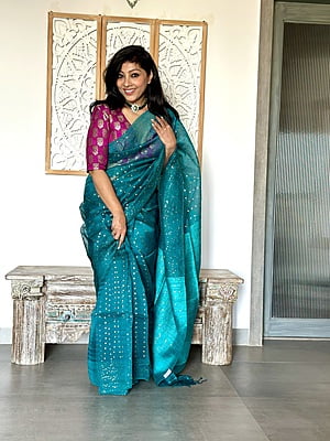Pure Muslin saree with all over Sequins woven and Woven Border - Green