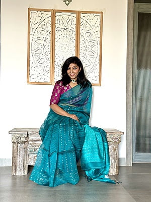 Pure Muslin saree with all over Sequins woven and Woven Border - Green