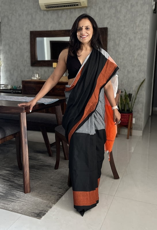 Black & Grey Khadi Cotton Saree with Orange Border Black & Grey Khadi Cotton Saree with Orange Border